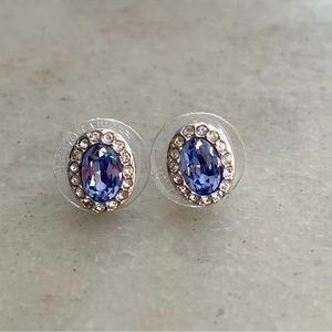 Genuine Swarovski Crystal silver rhodium plated earrings, with purple stone.